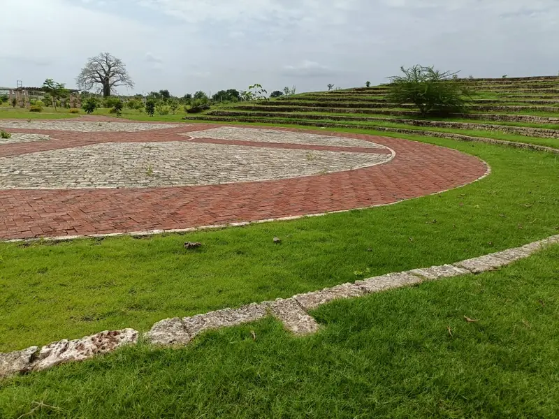 After: Kilifi park amphitheatre complete: grassed terraces around the brick and coral-stone stage